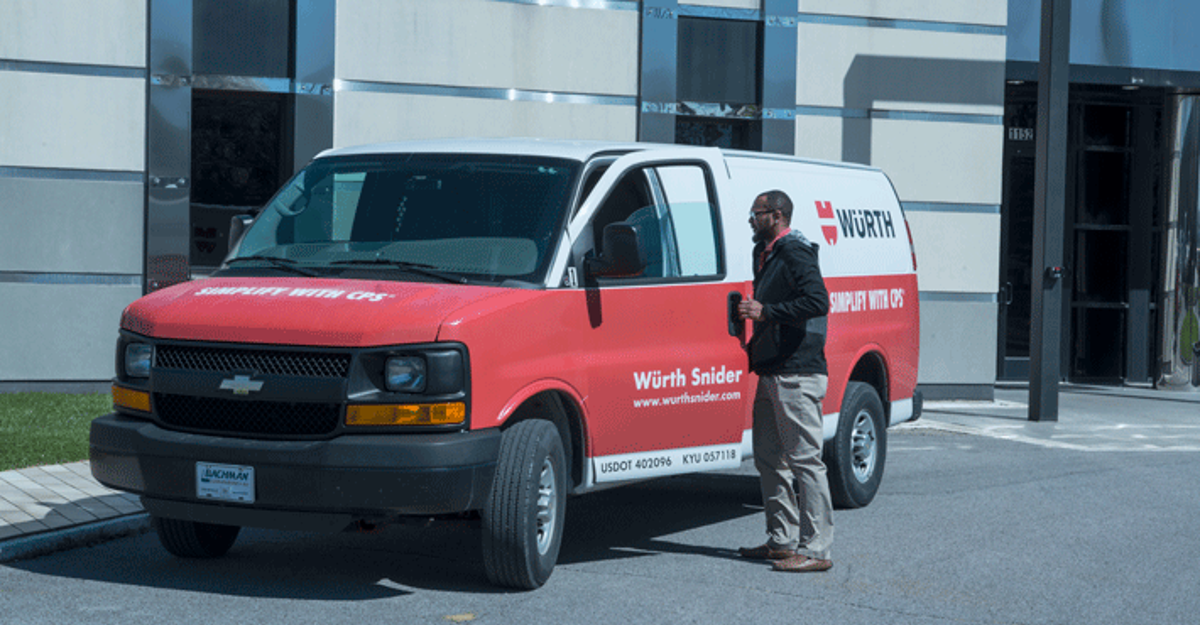 Red and White Würth Snider Van with Employee Getting In