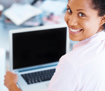 Woman Holding a Laptop