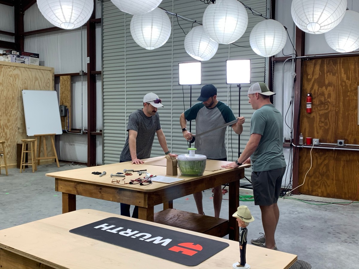 The video crew setting up for paint spillage from the “salad spinner” demonstration of the dip and spin finishing method in Episode 9.