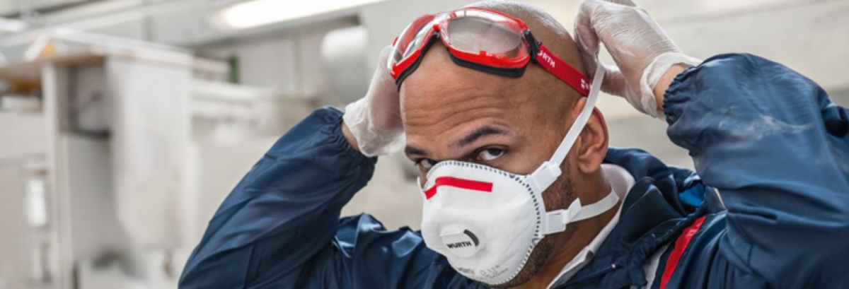Male Employee with Face Mask and Goggles